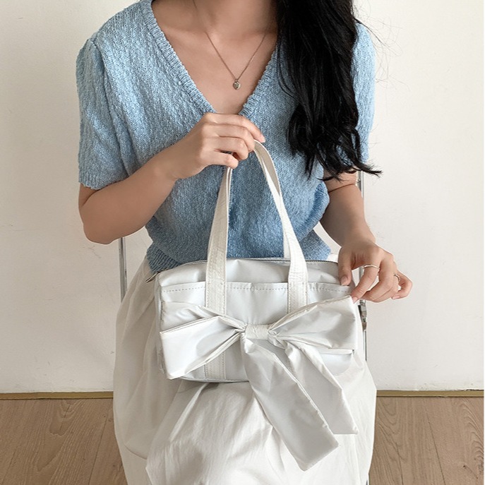 借物少女愛麗緹🦋R32韓國空運🇰🇷簡約高級感蝴蝶結圓筒包 手提包 單肩包 腋下包 蝴蝶結包包 軟皮包包 韓國包-細節圖7
