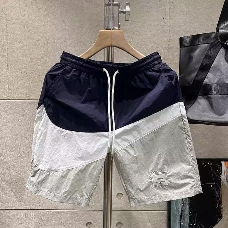 運動品牌大勾勾拼色休閒運動短褲-細節圖4