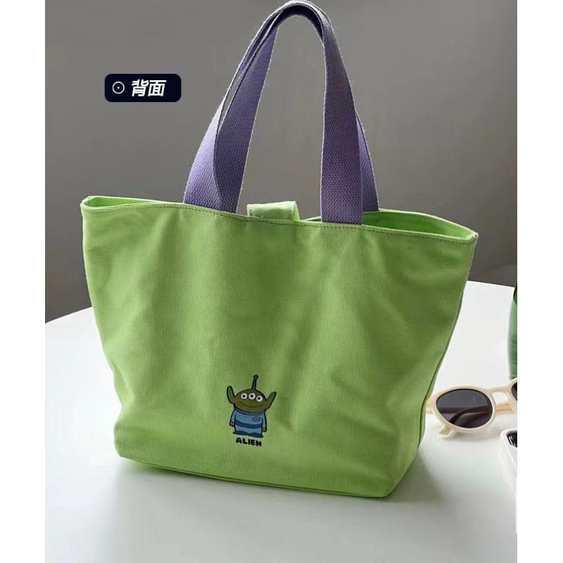 台灣現貨 台灣出貨 卡通微笑手提包 帆布包 三眼怪-細節圖3
