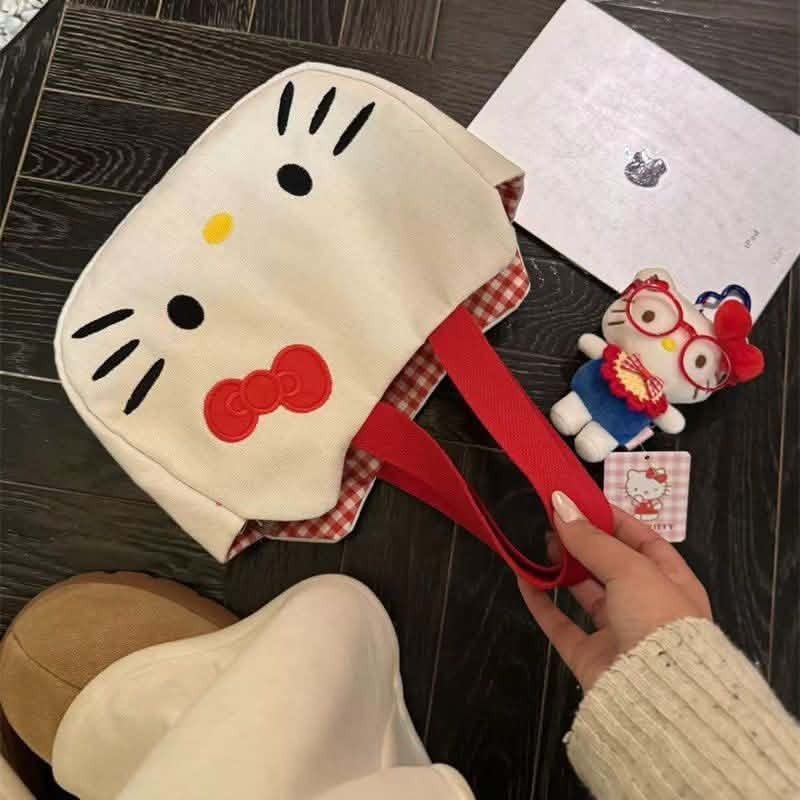 超欠買 Hello Kitty 托特包 KT 大臉帆布手提包 專櫃感 大容量 便當包 逛街 甜美可愛 百搭 女包 現貨秒-細節圖4