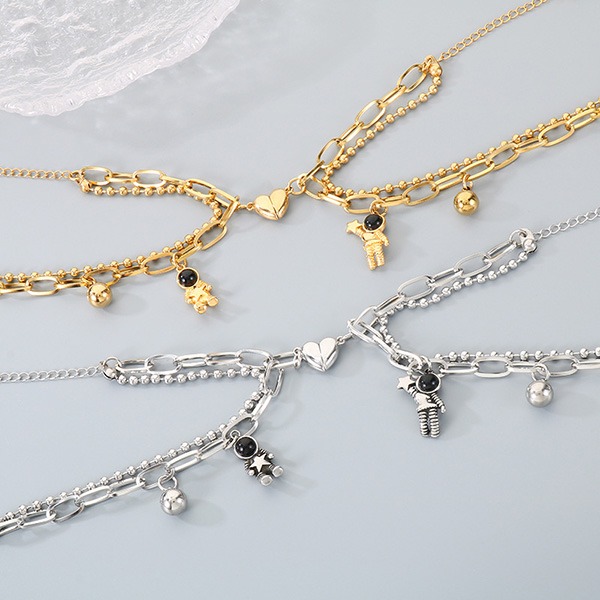 《 QBOX 》FASHION 飾品【BK208413】 精緻個性太空人摘心鈦鋼情侶手鍊/手環(二色)-細節圖6