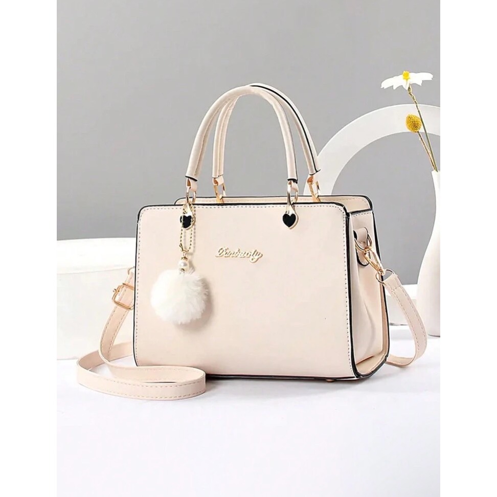 時尚手提包含絨球裝飾-細節圖3