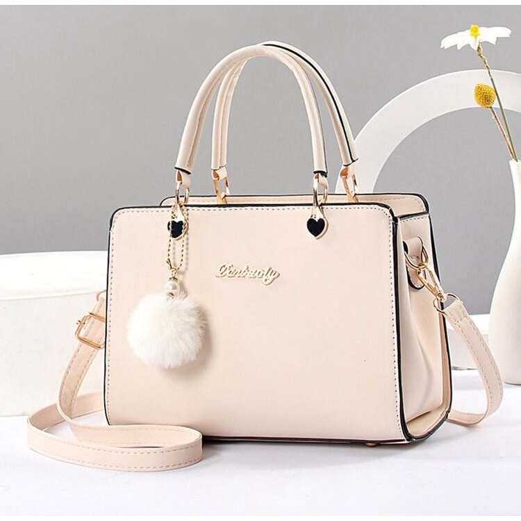 時尚手提包含絨球裝飾-細節圖8