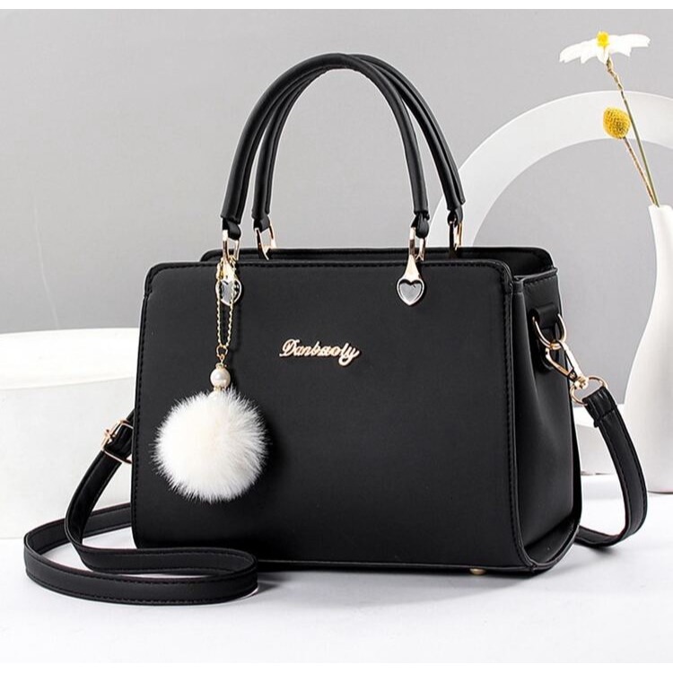 時尚手提包含絨球裝飾-細節圖9