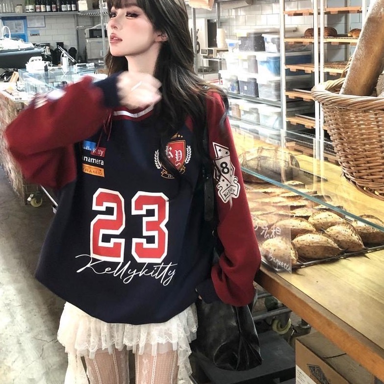 寬鬆斜肩梆帶設計感上衣-細節圖4