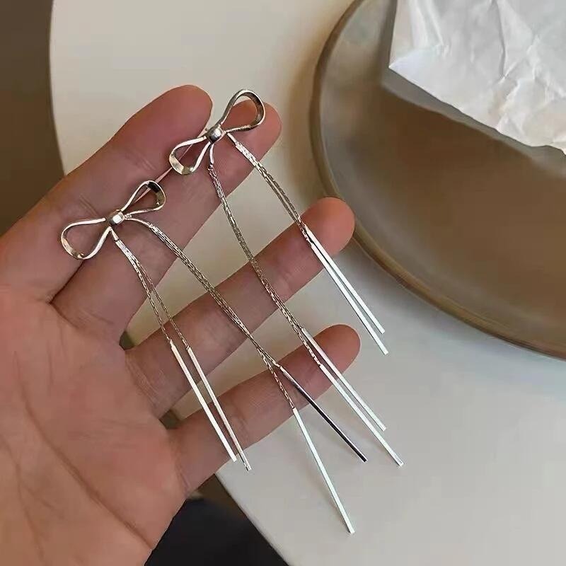 💖台灣現貨🌿輕奢甜酷辣妹冷淡風蝴蝶結流蘇耳線 個性簡約小眾設計感ins銀針長款耳環【G90】-細節圖2