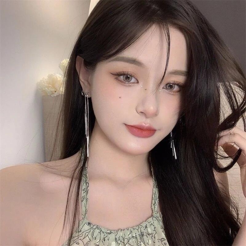 💖台灣現貨🌿輕奢甜酷辣妹冷淡風蝴蝶結流蘇耳線 個性簡約小眾設計感ins銀針長款耳環【G90】-細節圖3