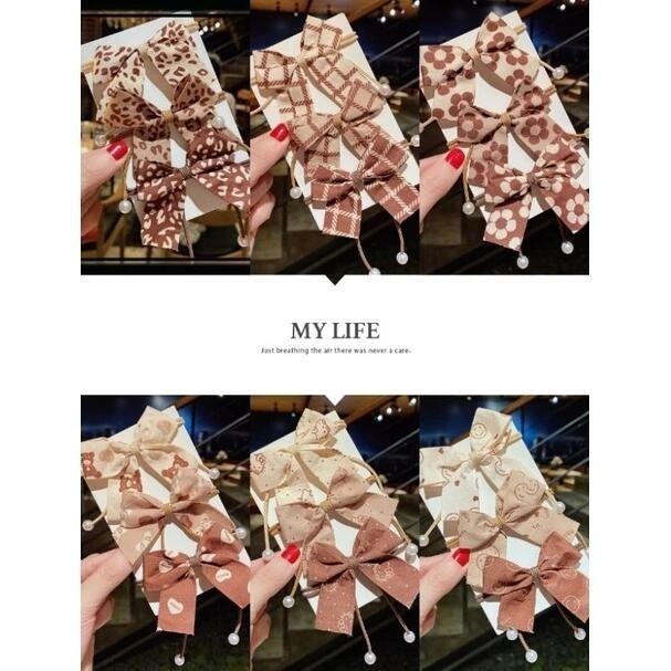 ✨台灣現貨🌿奶茶色髮繩 蝴蝶結珍珠髮圈 網紅ins韓版新款髮圈 彈力髮繩 綁馬尾 扎丸子頭髮飾【ND7】-細節圖3