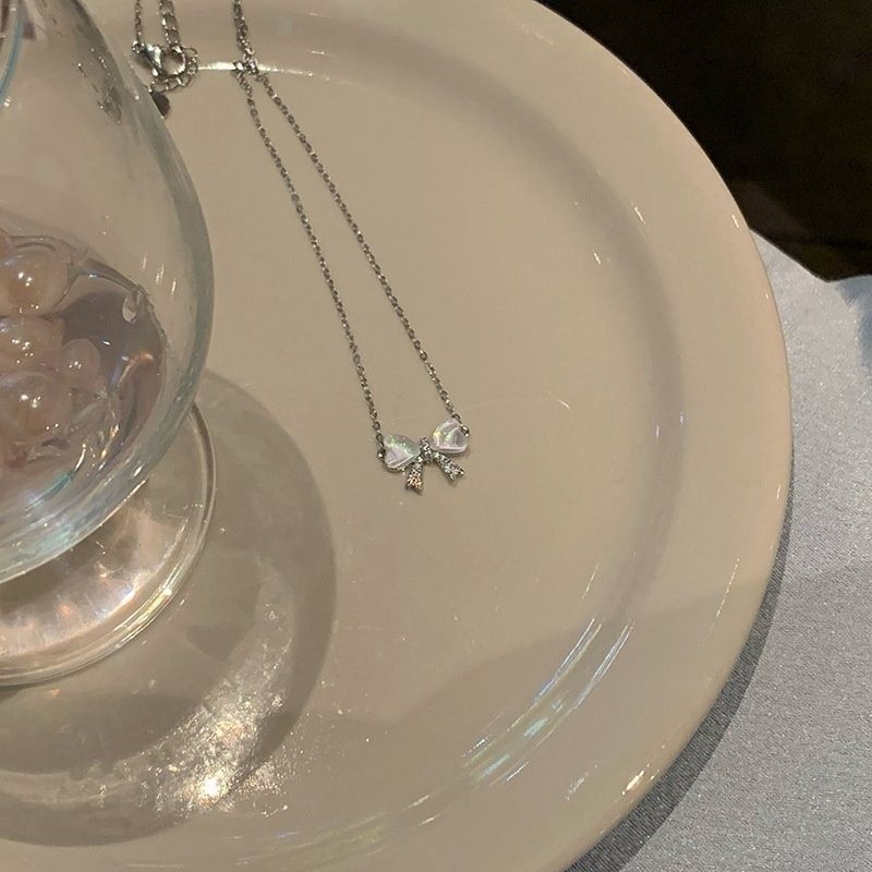👗台灣現貨🌿輕奢小眾貓眼石幻彩蝴蝶結項鍊 女ins簡約甜美鈦鋼鎖骨鏈【Q74】-細節圖4