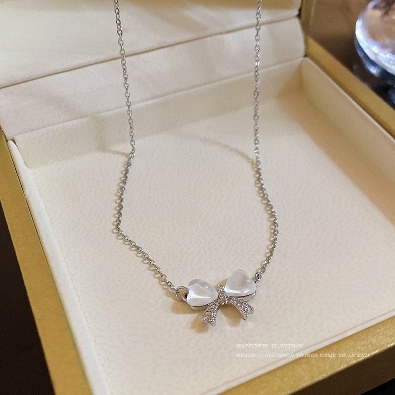 👗台灣現貨🌿輕奢小眾貓眼石幻彩蝴蝶結項鍊 女ins簡約甜美鈦鋼鎖骨鏈【Q74】-細節圖6