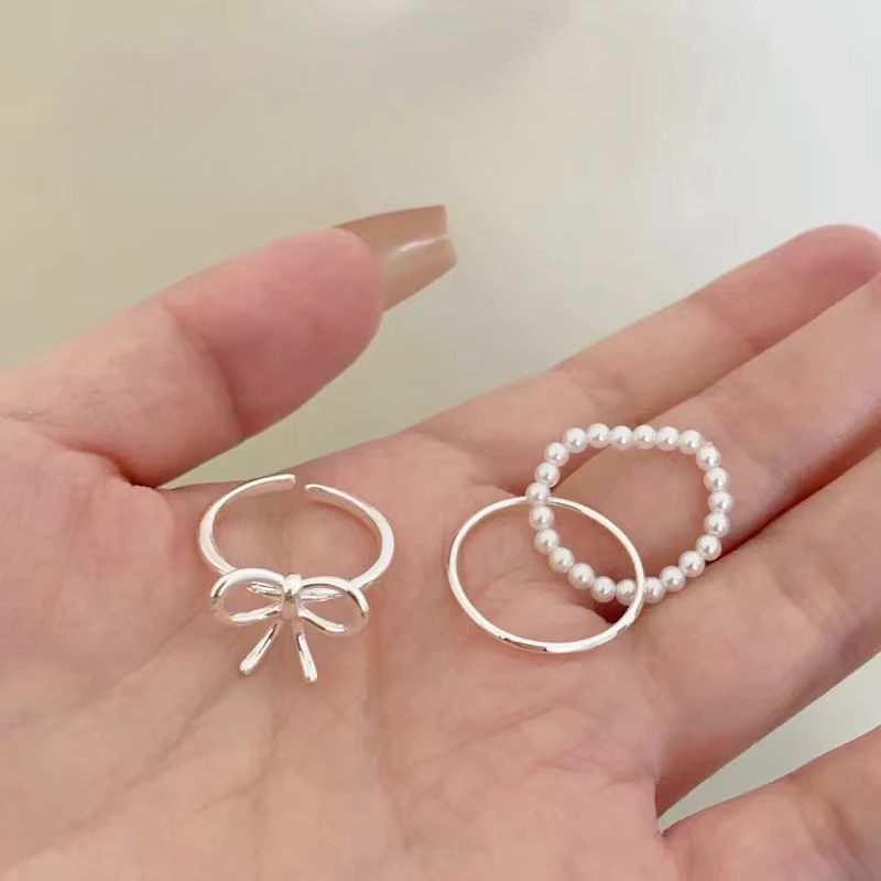 💍台灣現貨🌿蝴蝶結雙層珍珠交錯戒指個性獨特時尚潮流氣質百搭戒指指環食指戒【O75】-細節圖4