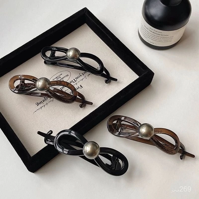 ✨台灣現貨🌿蝴蝶結氣質珍珠扭扭夾 一字夾  簡約金珠彈力夾 8字髮夾盤髮馬尾夾【N136】-細節圖5