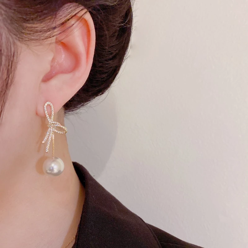 💖台灣現貨🌿打結蝴蝶結珍珠流蘇耳環 精緻滿鑲蝴蝶結珍珠吊墜耳環 輕奢氣質甜美耳飾【G500】-細節圖7