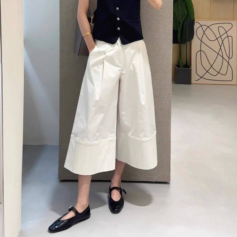 春。梨型身材超友好 慵懶個性 立體剪裁 白色高腰顯瘦A字休閒褲寬口八分褲褲裙-Euphoria Store-細節圖2