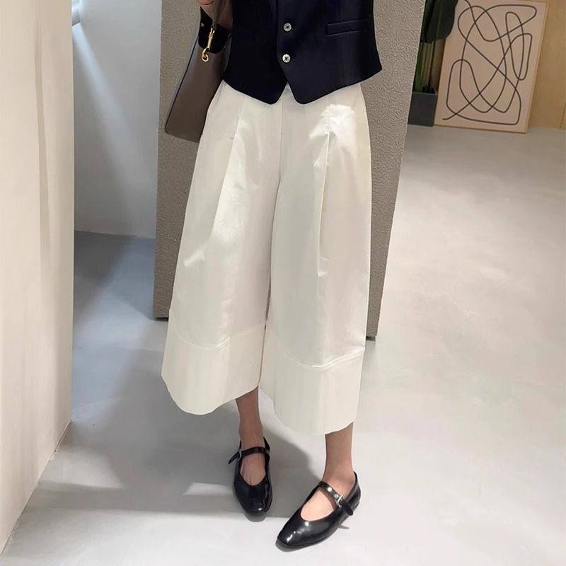 春。梨型身材超友好 慵懶個性 立體剪裁 白色高腰顯瘦A字休閒褲寬口八分褲褲裙-Euphoria Store-細節圖3