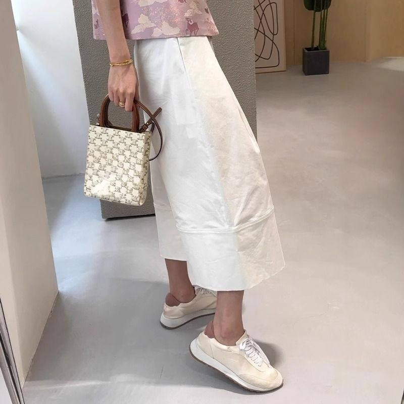 春。梨型身材超友好 慵懶個性 立體剪裁 白色高腰顯瘦A字休閒褲寬口八分褲褲裙-Euphoria Store-細節圖4