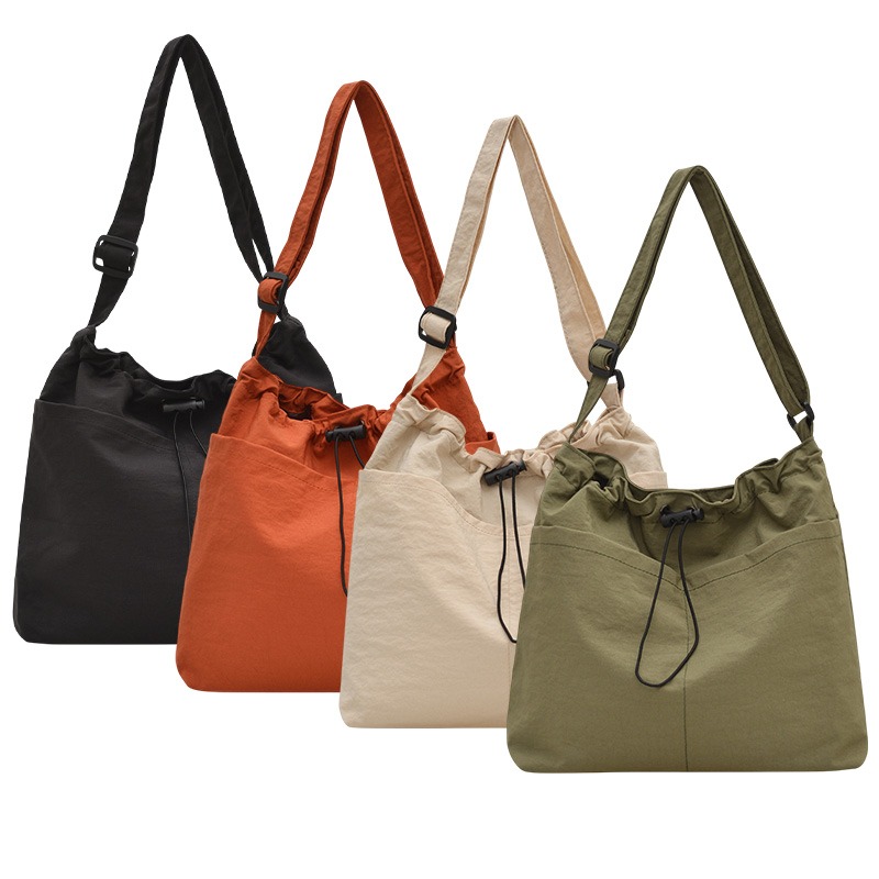 輕量托特包 抽繩束口斜背包 尼龍單肩包 韓版風格斜背包 抽繩水桶包 純色大容量斜背包-細節圖2