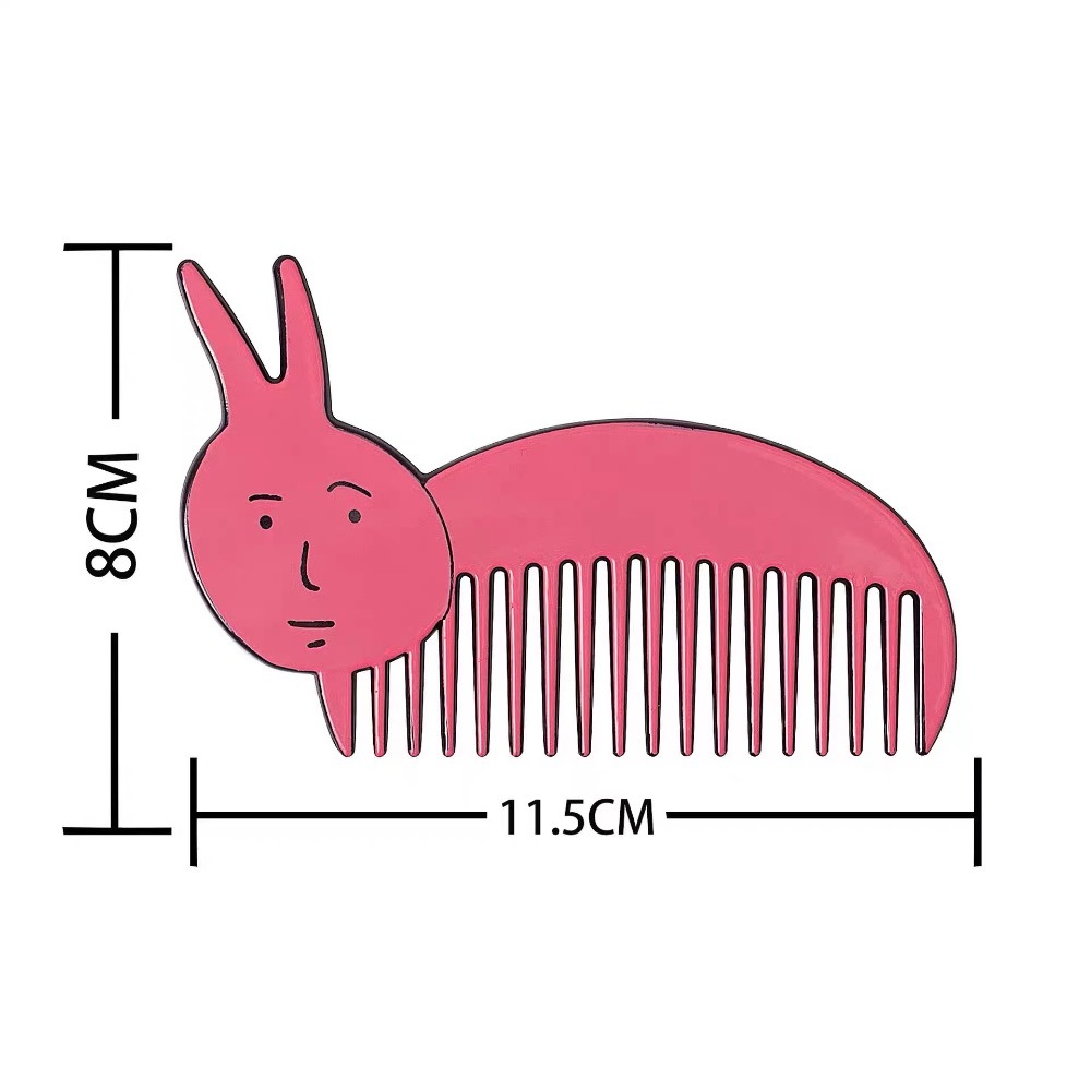 粉紅兔梳子一把