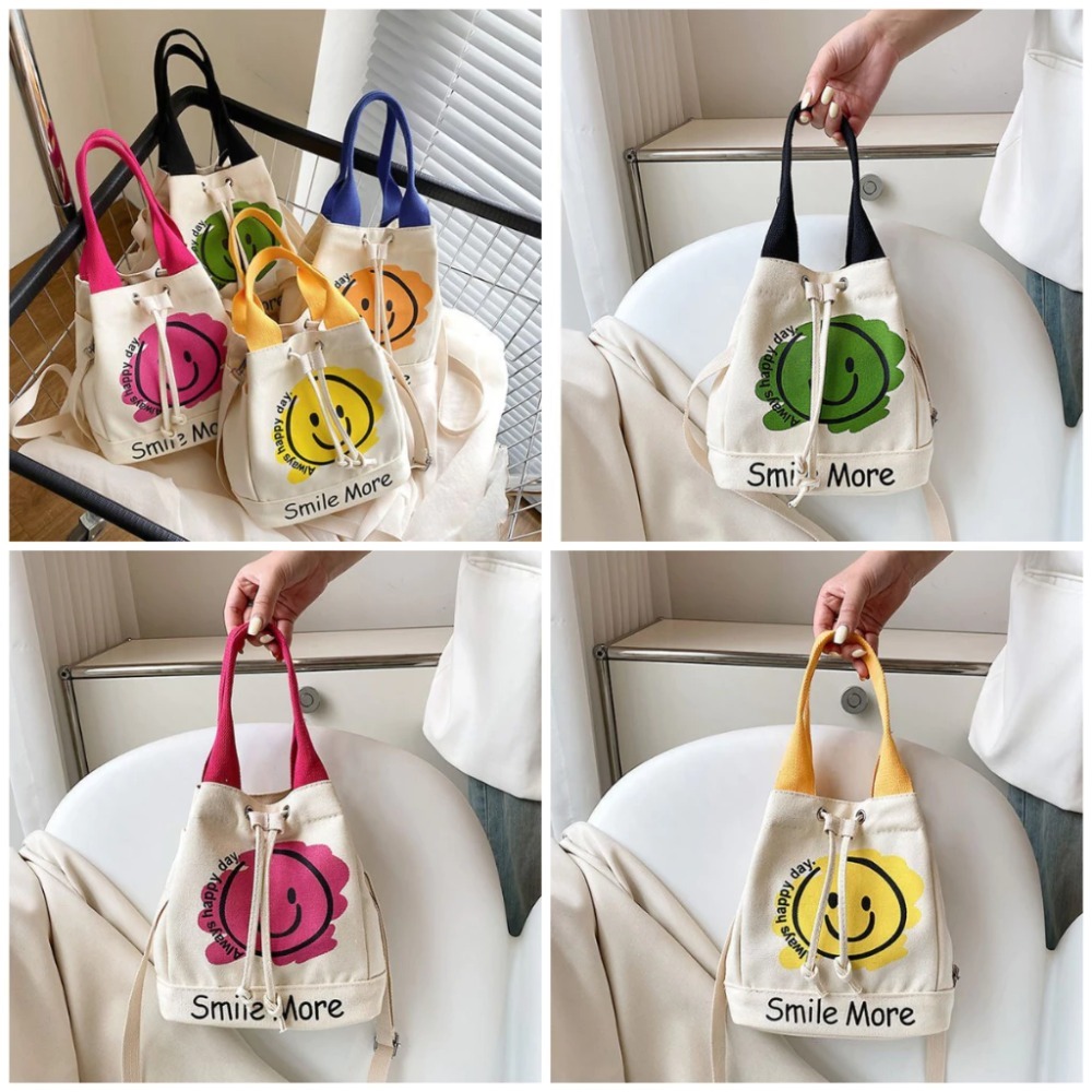 帆布水桶包 帆布包 微笑笑臉 提袋 手提包 斜背包 單肩包 現貨 實拍 小包大容量 水桶包 三用包 ．多-細節圖6