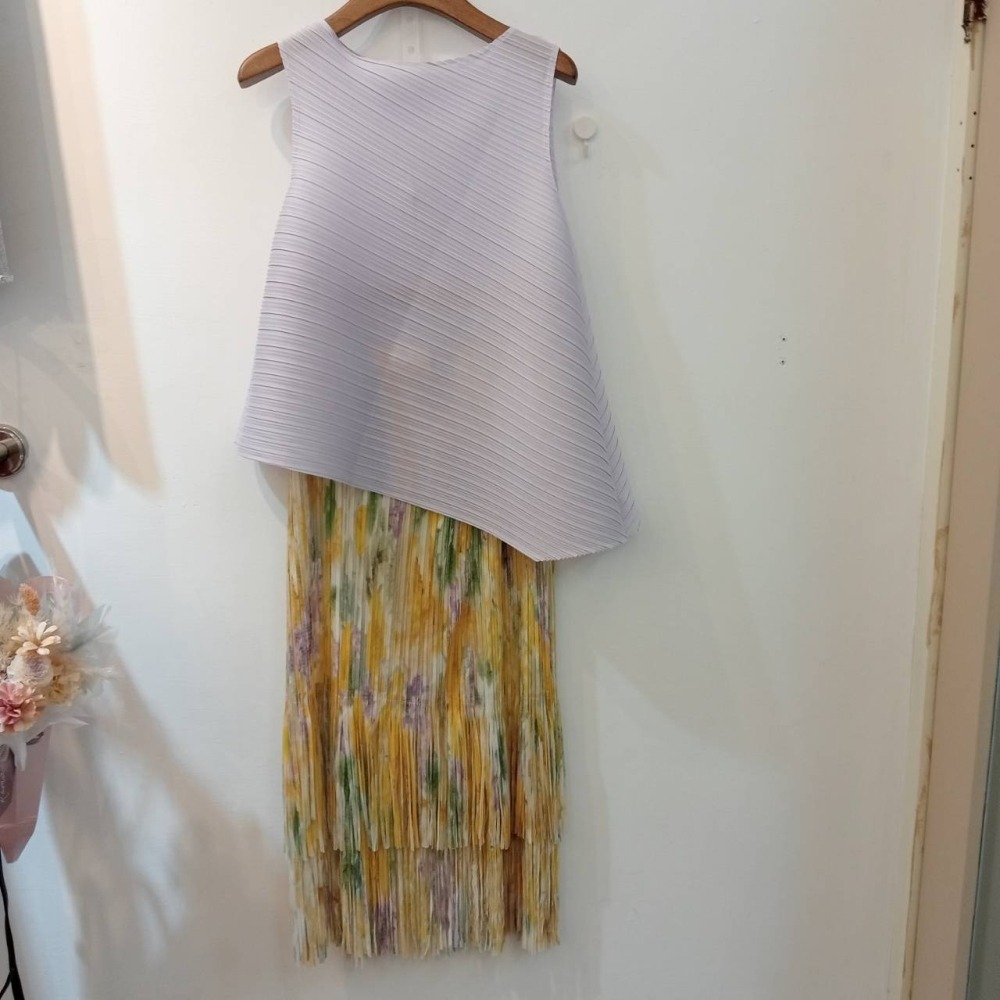 [H lovely]現貨-三宅氣質神款套裝.硬廷斜邊上衣.中長款.不規則裙.流蘇裙.顯瘦.甜美-檸檬黃色.乾燥粉.淡紫色-細節圖3