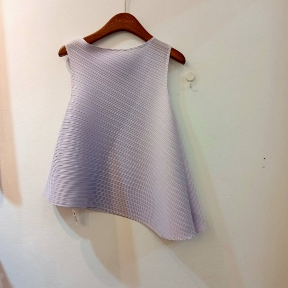 [H lovely]現貨-三宅氣質神款套裝.硬廷斜邊上衣.中長款.不規則裙.流蘇裙.顯瘦.甜美-檸檬黃色.乾燥粉.淡紫色-細節圖4